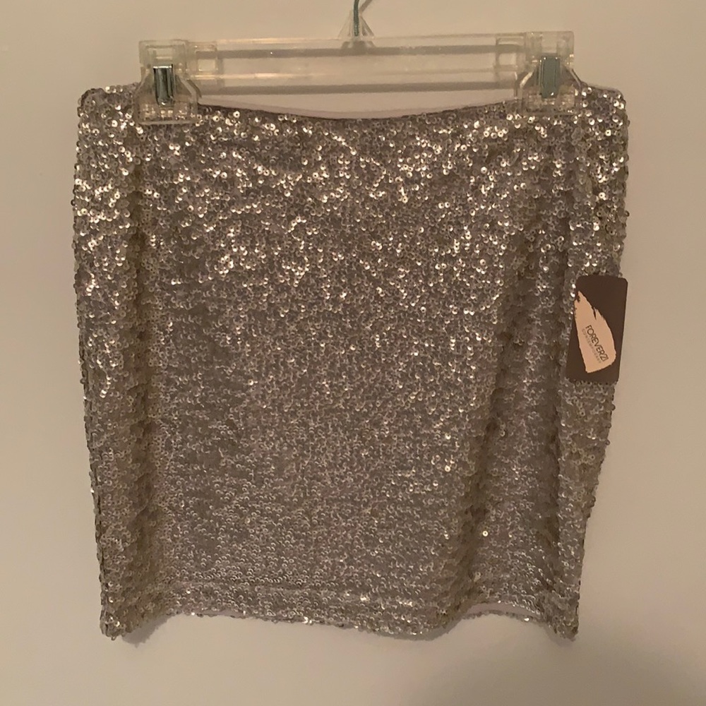 Forever 21 silver sequin skirt. NWT. Size S.